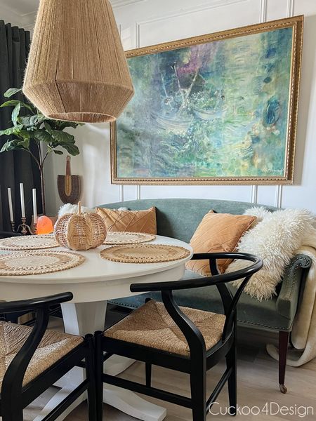 Fall updates to our dining room include a rattan pumpkin, dark green velvet curtains and some rust colored throw pillows #falldecor #diningroom

#LTKunder100 #LTKSeasonal #LTKhome