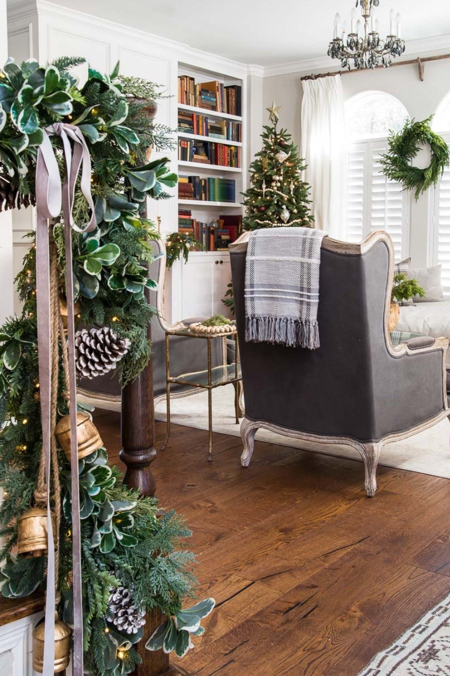 Classic Christmas living room decor 🎄

Cozy neutral holiday styling with layered greenery garlands, brass bells, a small gold-trimmed Christmas tree, winter wreaths, and soft throws. Linking my favorite garlands, bells, wreaths, and traditional Christmas accents to help you recreate this warm, classic holiday look.

#LTKHoliday