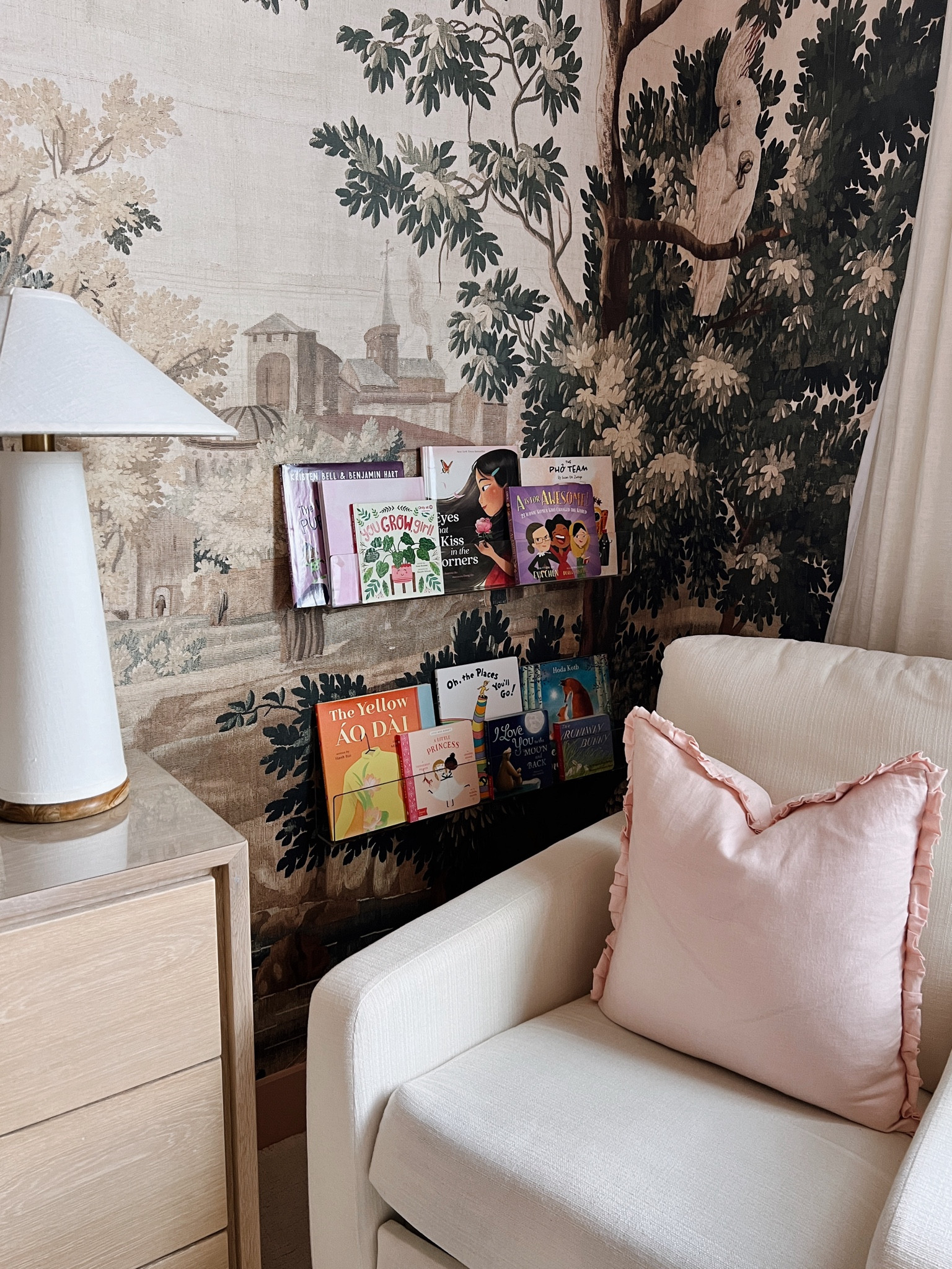 Our daughters nursery bookshelf including all her favorite books! Her personalized name book is from wonderbly! Linking the books, glider, wallpaper and more 

#LTKbaby #LTKhome #LTKstyletip