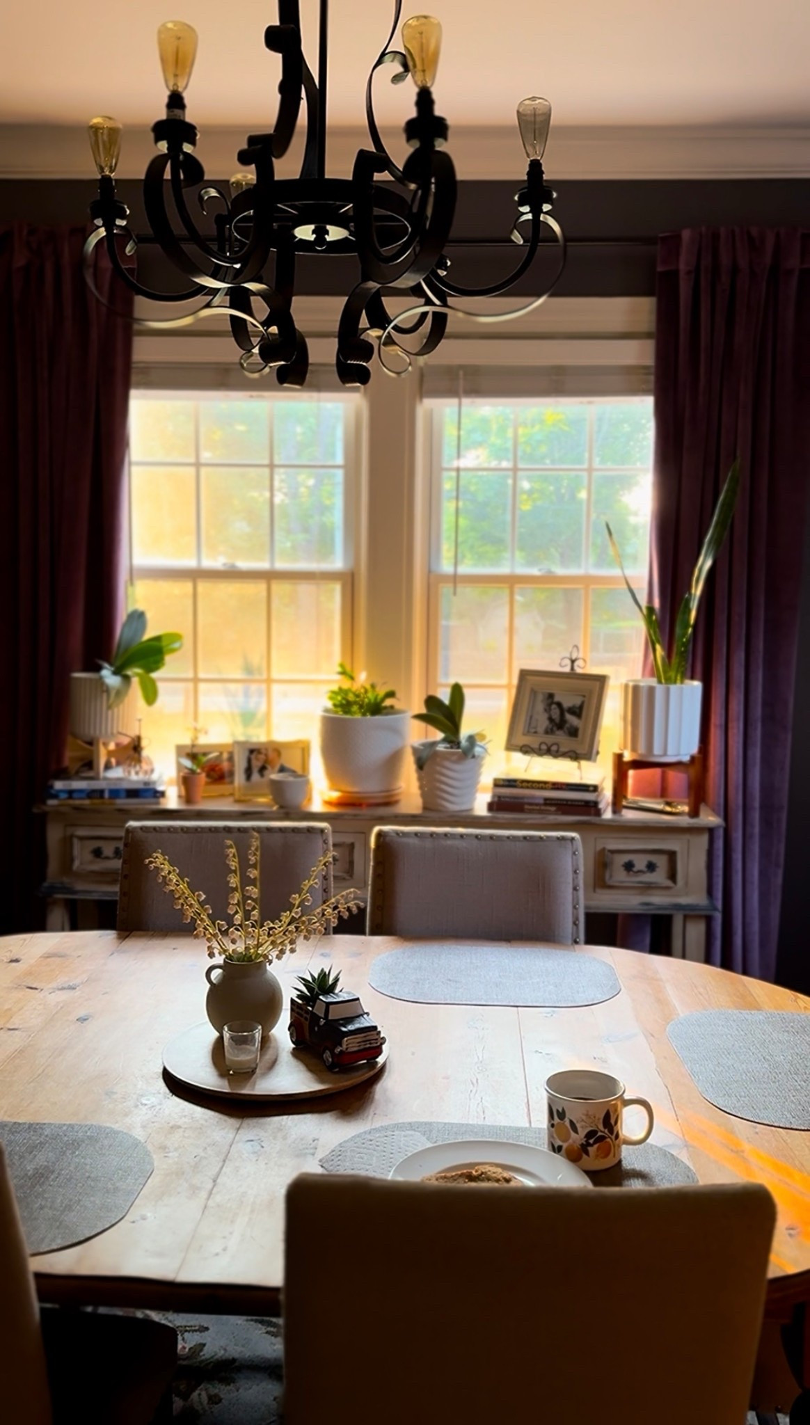 Moody dining room with velvet curtains & heirloom crystal 💜🕯️
This little corner of our rustic-modern home catches the prettiest morning light. I’ve slowly layered it with pieces I love — a wood dining table, plum velvet curtains, antique-inspired dining chairs, and my grandmother’s original Waterford crystal decanter (it’s not linkable, but it’s one of my most treasured heirlooms).

I’m linking similar pieces that give off the same cozy, collected vibe: think cottagecore meets moody luxe with a side of candlelight.

#LTKhome #RusticLuxe #VelvetCurtains #MoodyDiningRoom #WaterfordCrystal #HeirloomDecor #DiningRoomInspo #WildAndRootedLiving



#LTKHome