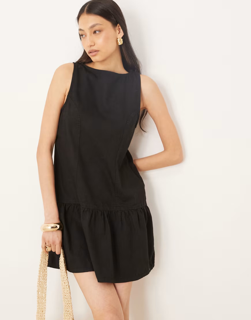 ASOS DESIGN denim drop waist mini dress in washed black | ASOS (Global)