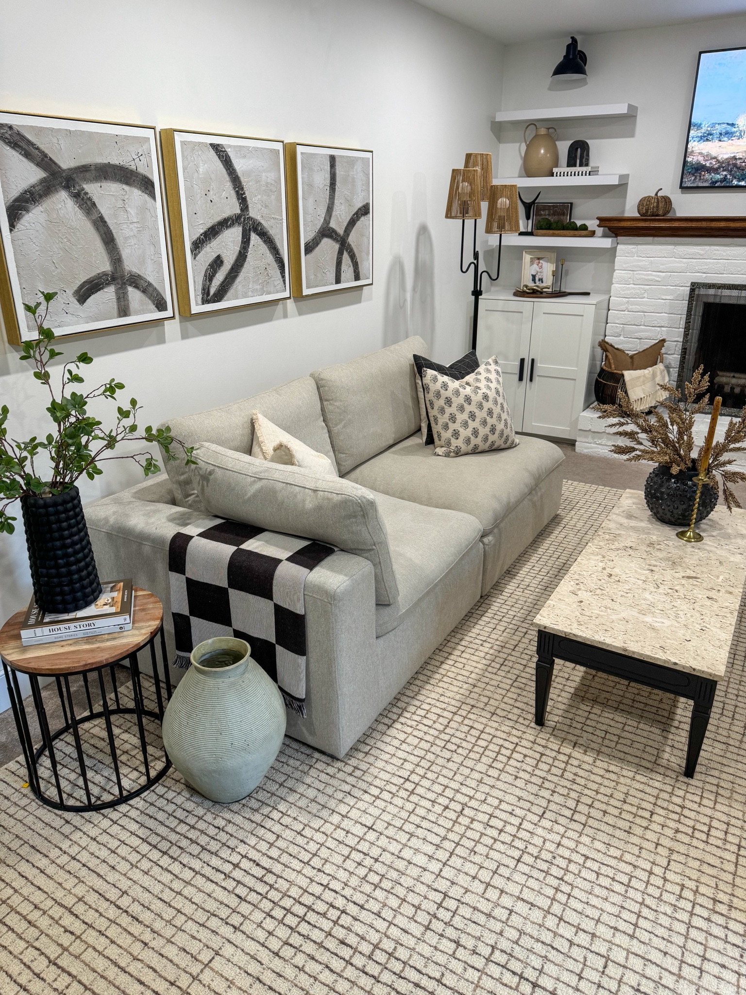 Earthy, neutral and cozy living room decor!

#homedecor #neutralhome #throwpillows #throwblanket #sidetable #fauxstems #floorlamp #decor #budgetfriendly 

#LTKcasa

#LTKHome #LTKStyleTip