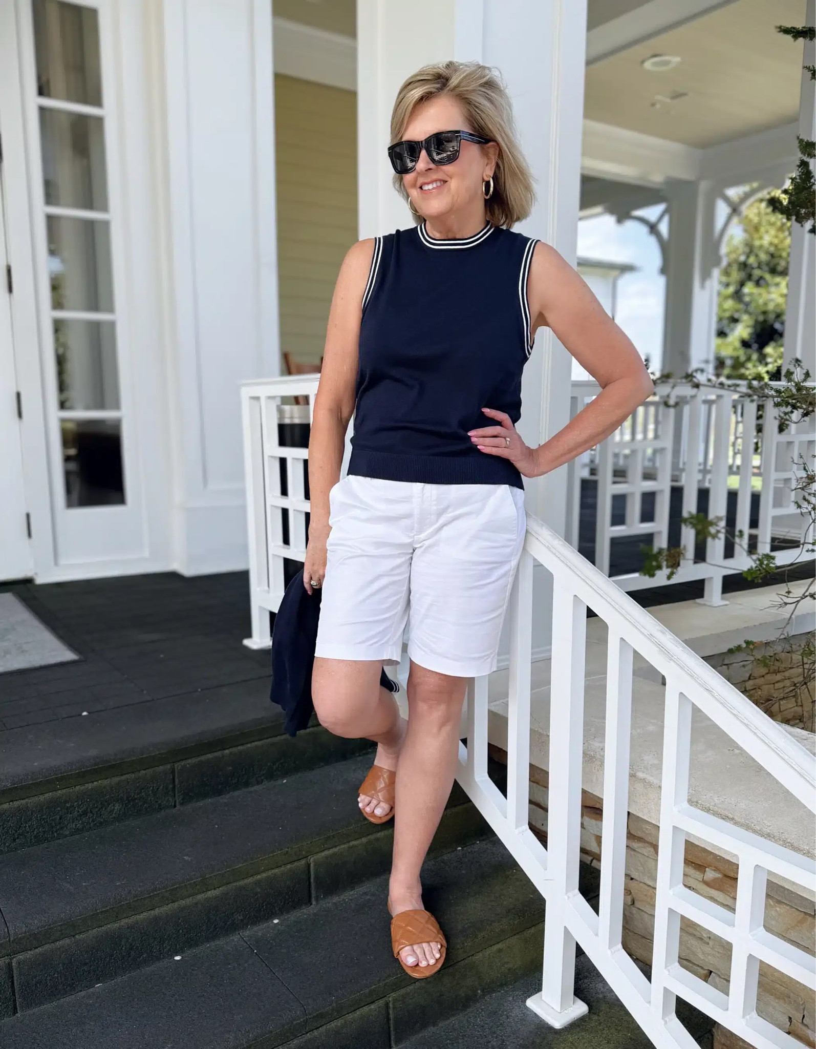 Navy and white outfit for Summer. My Bermuda shorts are 9” and great for everyday wear! I am wearing a size 8. 

#LTKootd #LTKOver40 #LTKTravel