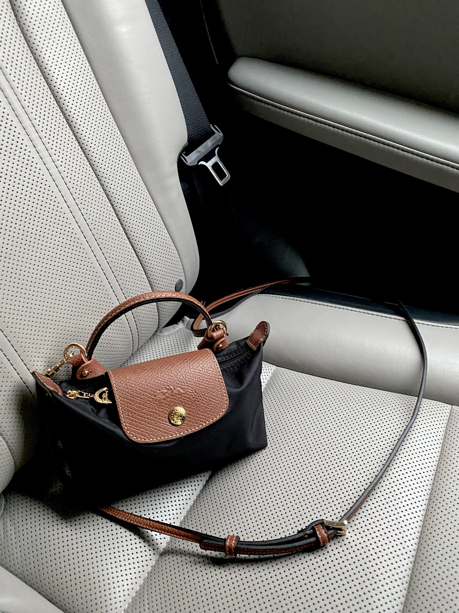 The iconic Longchamp Pliage bag is part of the Nordstrom Anniversary Sale!!!

It under $100 and comes in three different colors for fall and no, you don’t have to use it as a makeup bag.

Style your looks as a small top handle bag or add a matching strap from Amazon and turn it into a crossbody!

#LTKSummerSales #LTKStyleTip #LTKxNSale