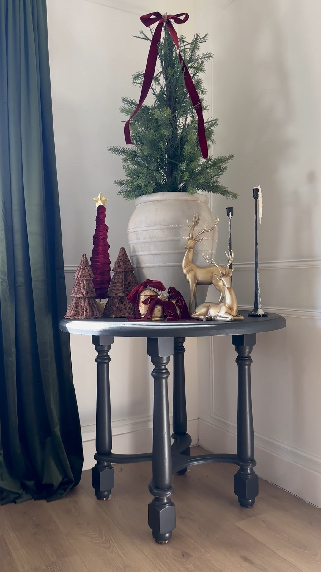 Round Entryway table decor decorated for Christmas. I used this whimsical mini Christmas tree and added these woven mini trees, bells, reindeer and candle holders. 

Round entryway table 
Christmas decor
Entryway table 
Round table 
Vintage table 
Vintage Christmas 
Stairway entry 
Green curtains 
Christmas tree 
Pottery barn 
McGee 
Magnolia 
Walmart 
My Texas house 
Ralph Lauren Christmas 
Burgundy red ribbon 
Velvet ribbon 
Round table 
Pedestal table 
Vintage table 
Iron candle holders 
Candles 
Green curtains 
Traditional Christmas 

#LTKHoliday #LTKFindsUnder50 #LTKHome