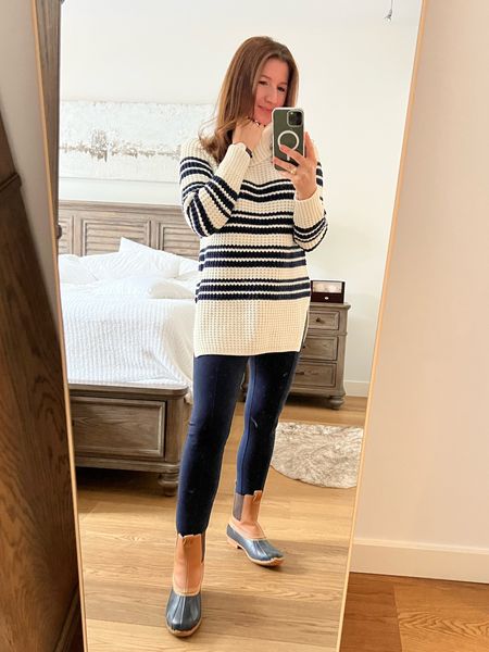 Nautical stripes and duck boots! 

Love this blue and white nautical striped split neck tunic sweater (linked but also linked similar style). Paired with navy leggings and Chelsea duck boots. Boots on sale up to 60% right now with code APPLE! 

#nautical #coastalgrandmother #duckboots #chelseaboots #rainydayoutfit #falloutfit #leggings 