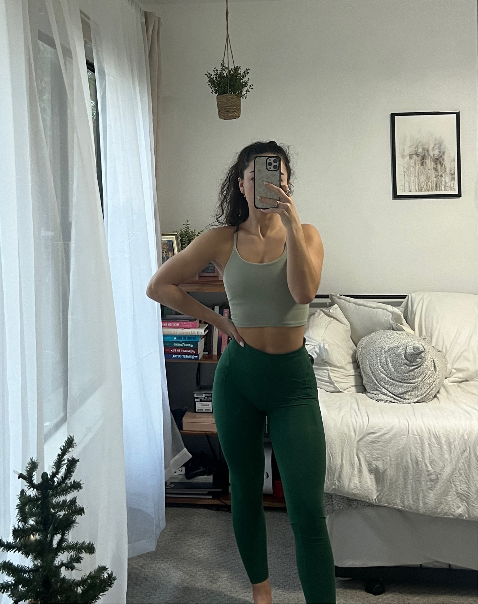 a lil festive grinch workout ootd moment 💚 we watched the grinch last night and I realized after getting dressed I was unintentionally channeling that hahaha. Love these amazon tanks for working out so much, I’ve had this one for like 3 years and it’s still going strong and is honestly so supportive & stays put. These leggings are old but I linked the speed leggings which are super similar & the winder trains that have a similar color!

#LTKfitness #LTKfindsunder50 #LTKSeasonal