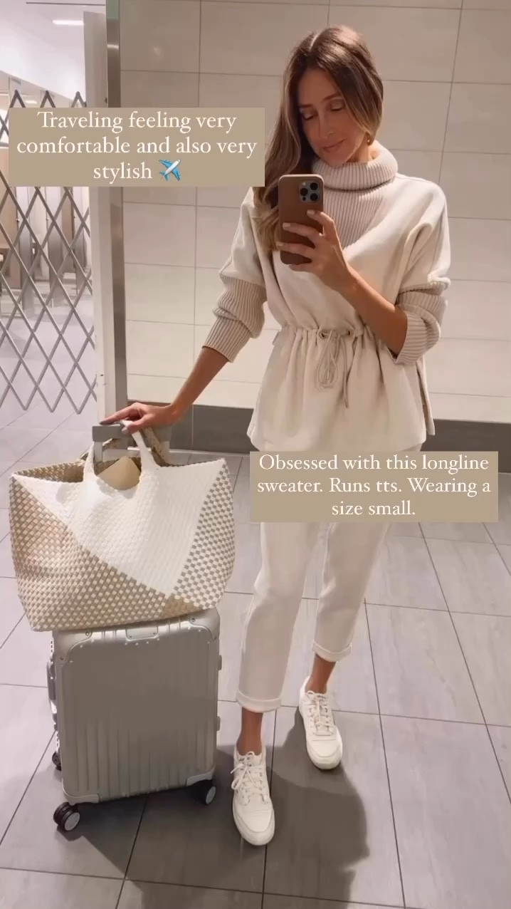 Traveling feeling very comfortable, and also very stylish. I am obsessed with this long line sweater. It looks very chic and also very comfortable. Everything runs tts. I am wearing a size small on top and bottoms. These Reebok sneakers are one of my favorite sneakers when it comes to comfort and style. They go with pretty much any outfit and they are extremely comfortable. Perfect to travel and to stand for a long time. 
Taking my favorite new tote for a  long ride today! 


#LTKOver40 #LTKItBag #LTKTravel