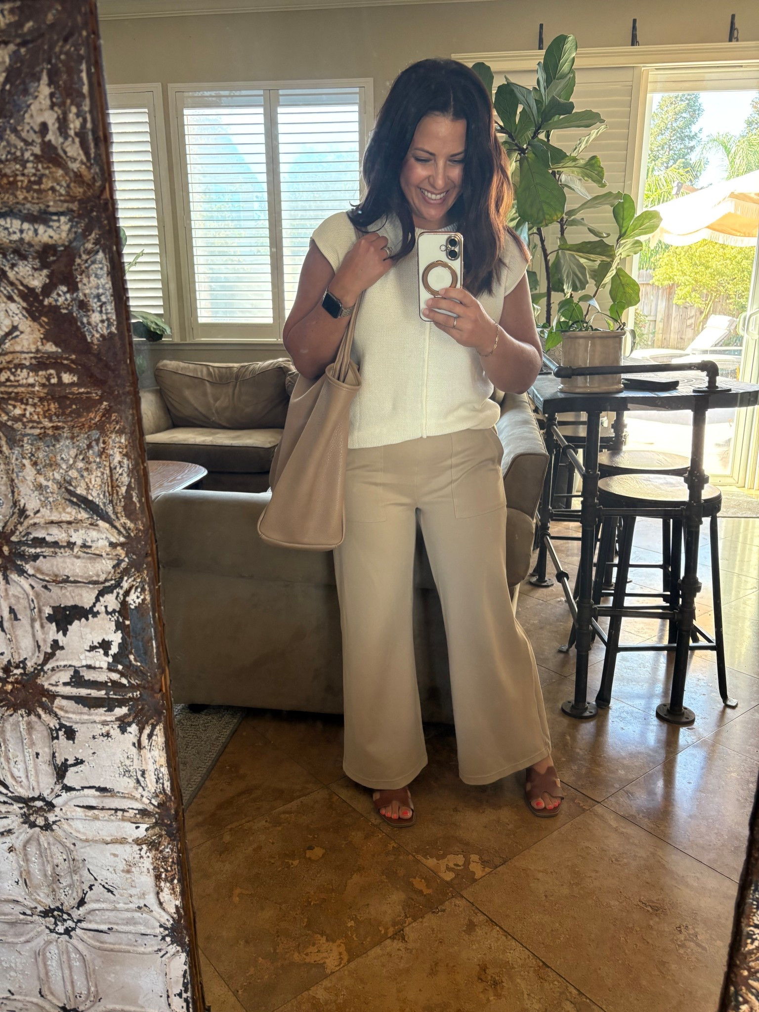 Easiest outfit ever for the classroom or office. Pull on wide leg trousers that feel like pajamas, but look polished and a lightweight sleeveless sweater that is super soft and perfect for this pre fall weather. My pants are petite friendly and come in different lengths, I’m wearing the size small with a 26” inseam, also wearing a small in my sweater. I also have these pants in black, they wash and dry well, I’ve had them for 2 years. 
Teacher outfit
Teacher style 

#LTKWorkwear #LTKOver40 #LTKPetite