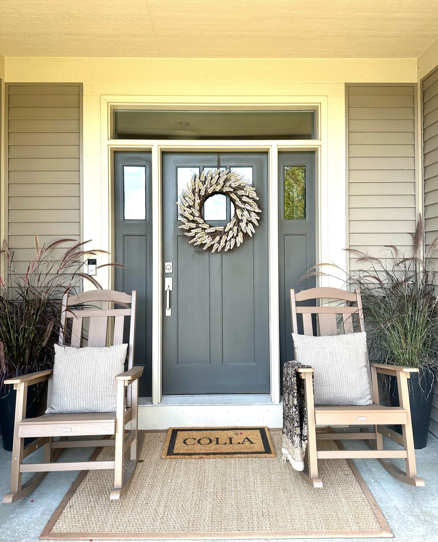 Fall outdoor front porch! Simple styling that is easily switched to other seasons and holidays such as Halloween and Christmas! 

#LTKSeasonal #LTKFindsUnder100 #LTKHome