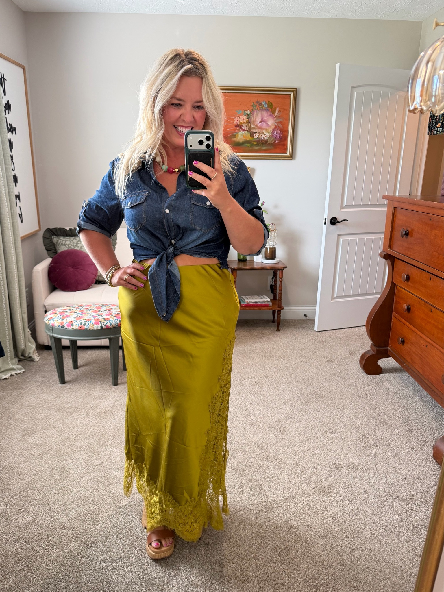 This satin & lace $30 Amazon maxi skirt when viral for a reason! I am wearing my true size large & I styled it 5 ways in a past post so if you want to see the rest of those, just scroll back! But in this pic, I am wearing the cutest denim button up that is designed to tie in the front so it's not too long & bulky like a traditional button up. Paired it all with the $12 chunky necklace I wear with everything. All AMAZON!!!

#LTKOver40 #LTKMidsize #LTKPetite