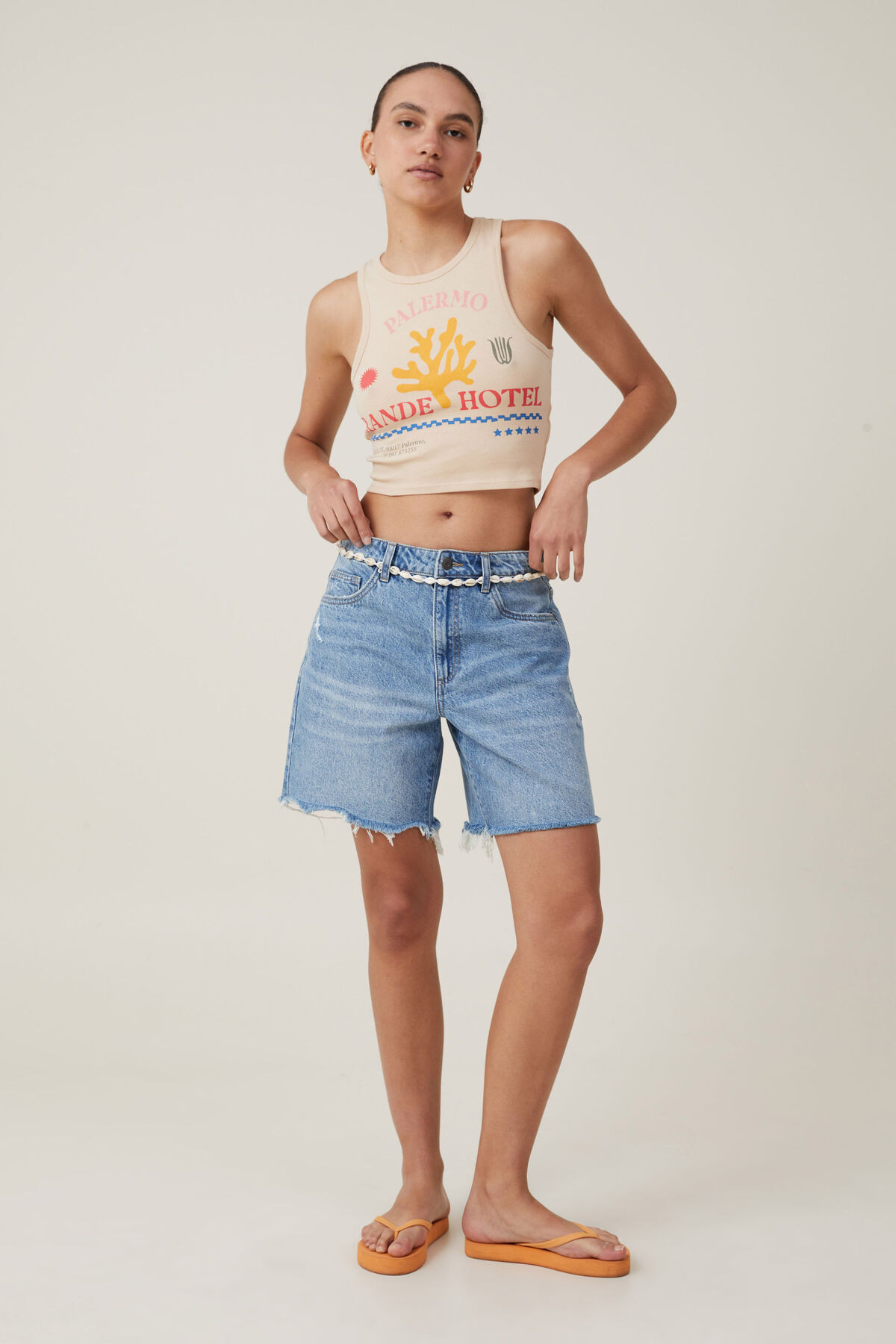 Crop Ribbed Graphic Racer Tank | Cotton On (US)