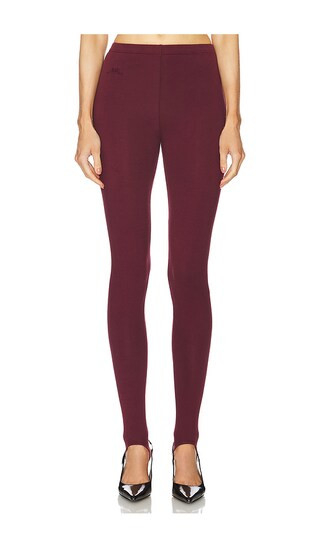 Rowen Rose Stirrup Legging in Wine. - size 36 | Revolve Clothing (Global)