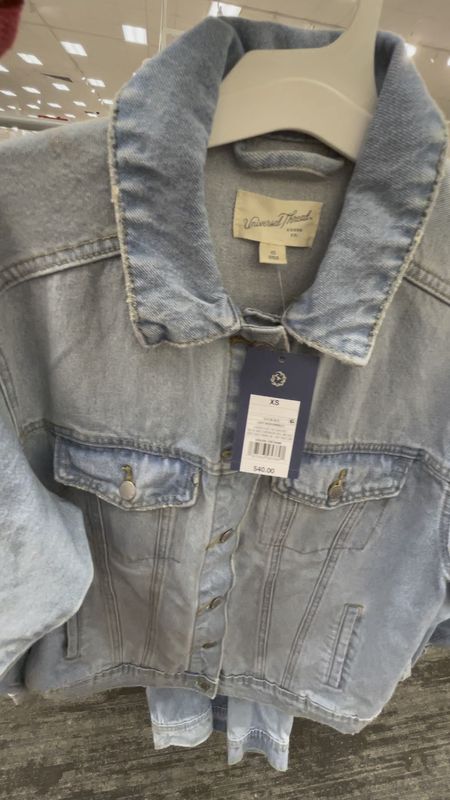 Universal Thread '90s baggy trucker jacket in light wash
100% cotton denim
Collared front with full-length button down
Long sleeves with buttoned cuffs
Chest and waist pockets

#LTKfindsunder50 #LTKSpringSale #LTKstyletip