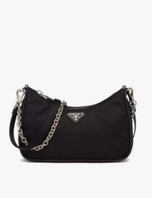 Chain-embellished leather and recycled-nylon shoulder bag | Selfridges