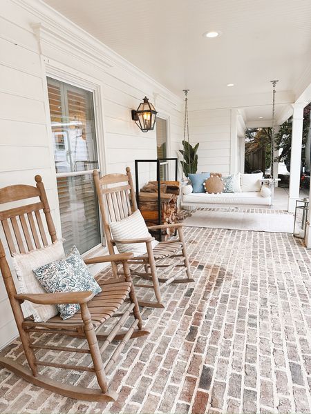 Porch inspo, porch design, outdoor patio, outdoor porch, porch swing, rocking chairs, outdoor pillows 

#LTKstyletip #LTKsalealert #LTKhome