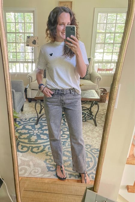 Tee and jeans from H&M - cutest Mickey t-shirt (can’t find exact one online) and straight grey jeans. My fav Michael Kors sandals

#LTKover40 #LTKSeasonal #LTKshoecrush