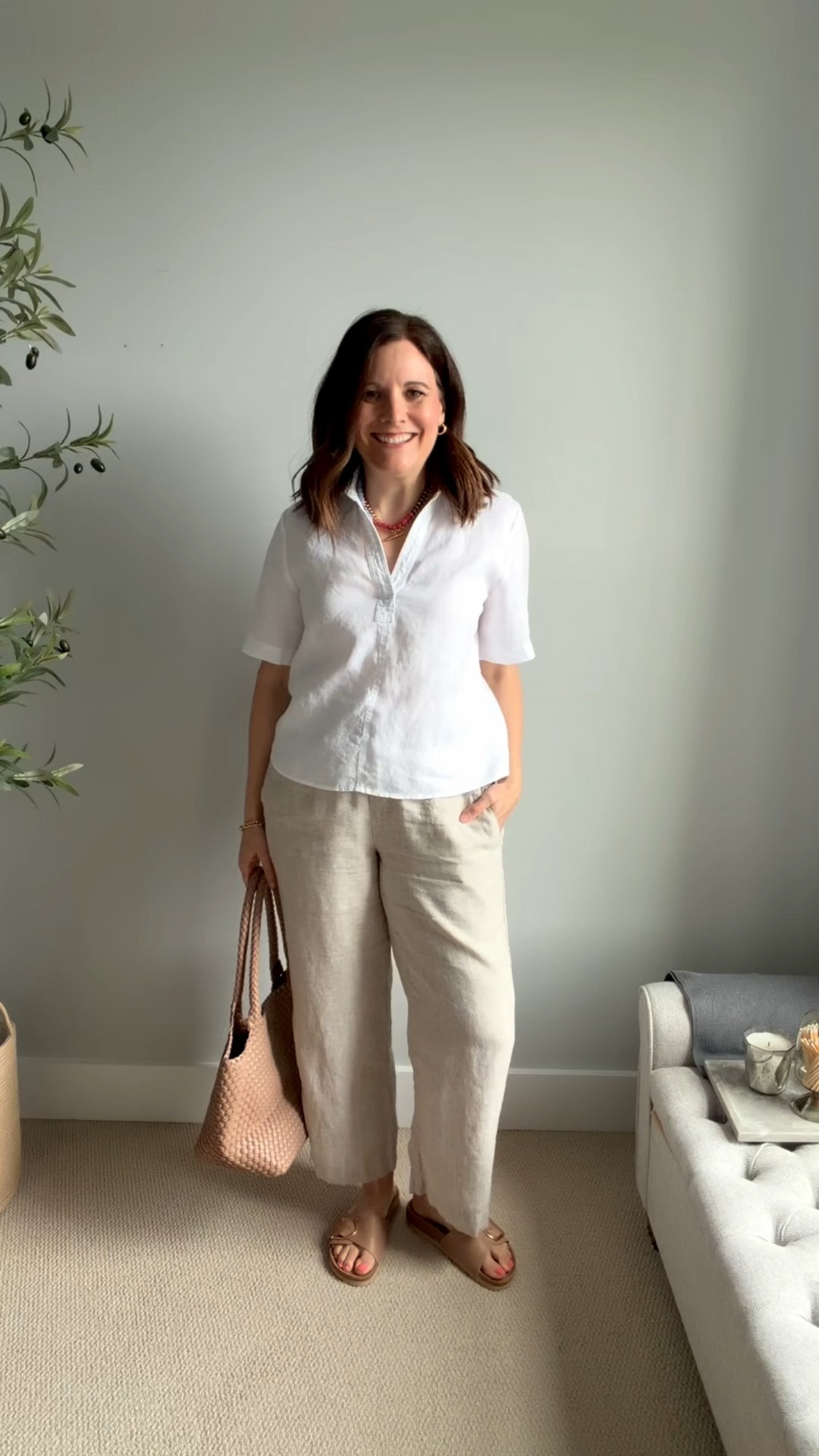 I’m always looking for alternatives to a simple white tee that are just as easy to wear but make an outfit pop. I chose this one because it has classic short sleeves for upper arm coverage, and you can leave it untucked to cover a midsection. 
I’m wearing a size medium, my true size. I washed it on a cold delicate cycle and tumble dried low, and there was no shrinkage.
For the pants, the wide waistband gives waist definition, and multiple comments mention how flattering and smoothing it is for a soft belly. These have no pocket show through and short back pockets that easily lay flat. They stretch minimally with wear and don’t shrink when washed. I do recommend running an iron over them so they look crisp and wearing nude underwear. My navy underwear definitely shows through.
They fit true to the sizing chart. I’m wearing the 28”, which works with flat shoes at 5’6”, and I’m in my usual medium.

#LTKOver40 #LTKSaleAlert #LTKMidsize