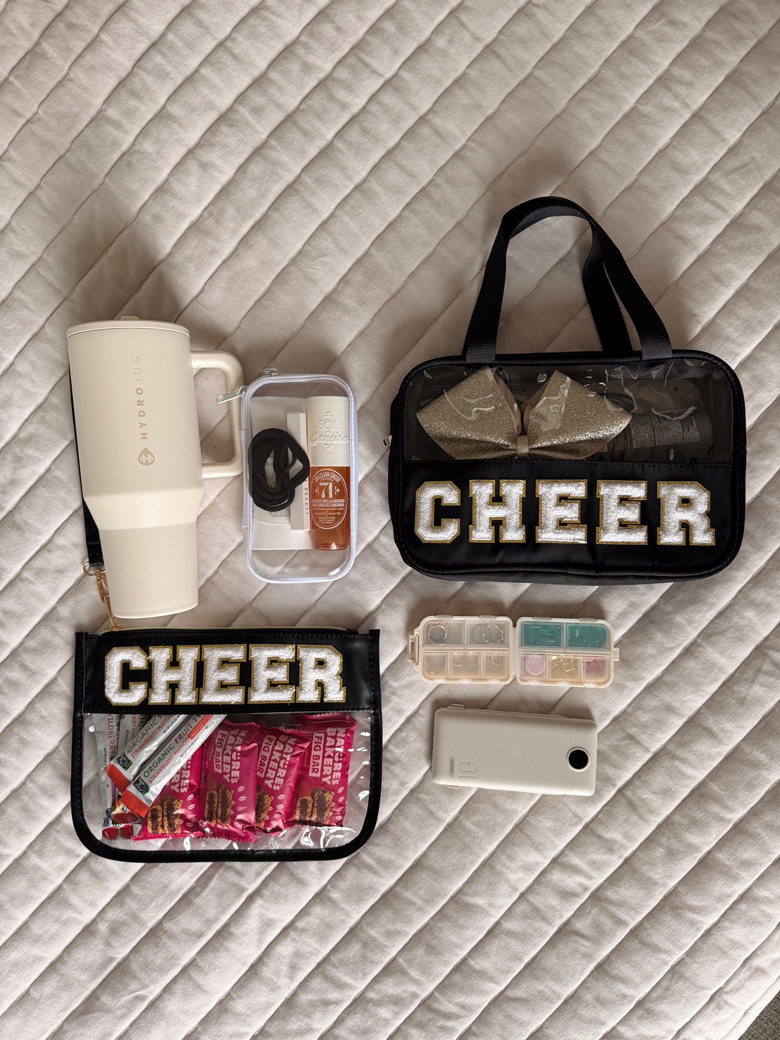 Everything you need to keep cheer gear organized and ready to go! From a cheer bag and makeup pouch to a water bottle, beauty essentials and small organizers, these game day must-haves make practices and competitions so much easier.

#LTKSeasonal #LTKHome