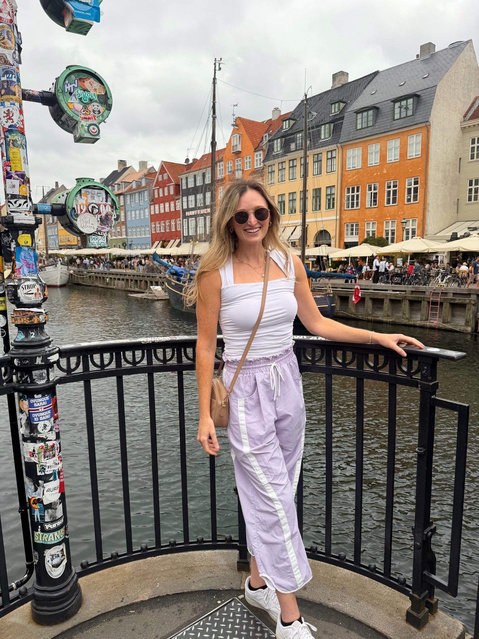 Realistic travel day outfit. Casual, comfortable sightseeing vacation outfit. Free people look alike affordable purple parachute jogger pants, ruched white flattering classic tank top, nude crossbody travel purse

#LTKTall #LTKTravel #LTKActive