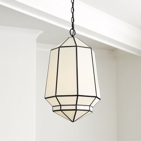 Morrocan-inspired milk glass pendant. This affordable lighting brings drama abd is especially striking in an entry, powder room, small stairwell or even as kitcheb pendants.  The graphic hexagonal frame is crafted of steel and fitted with tapered panels of glass to create a warm inviting glow. You can hang this lighting on a sloped ceiling.

#LTKhome