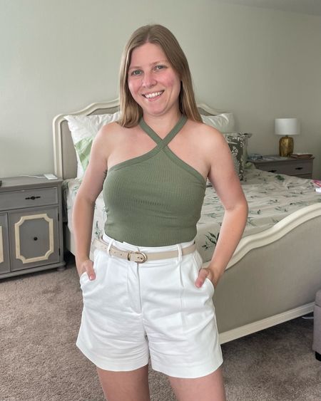 Ribbed halter tank top in green with white high waisted shorts. Summer outfit idea  
