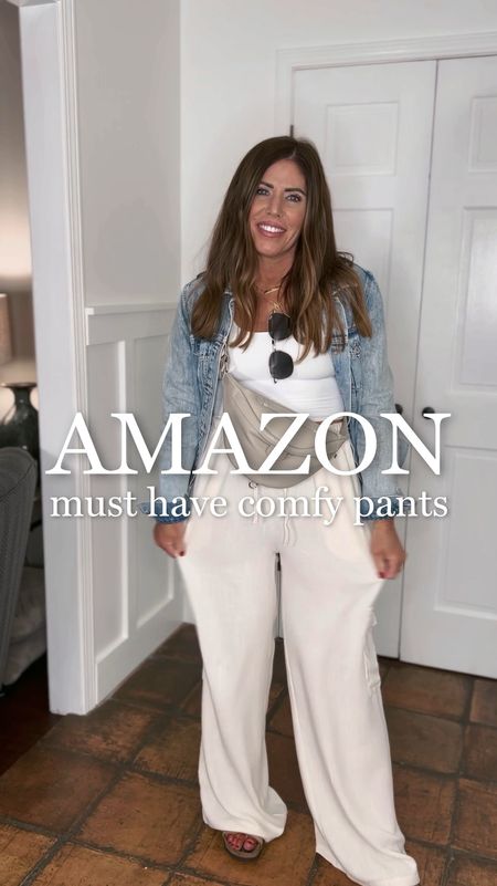 Amazon must have comfy pants- all under $30

Three different pairs of pants, same outfit 

My favorite distressed denim jacket -size up 1-2 sizes for an oversized fit.

Seamless Square neck Cami 

1-Linen blend drawstring, cargo pants 
2-Look for less Linen blend elastic waist pants 
3-Look for less Cotton blend look for less elastic waste harem style pants 

Birkenstock big buckle sandals 
Leather bumbag





#LTKover40 #LTKstyletip #LTKfindsunder50