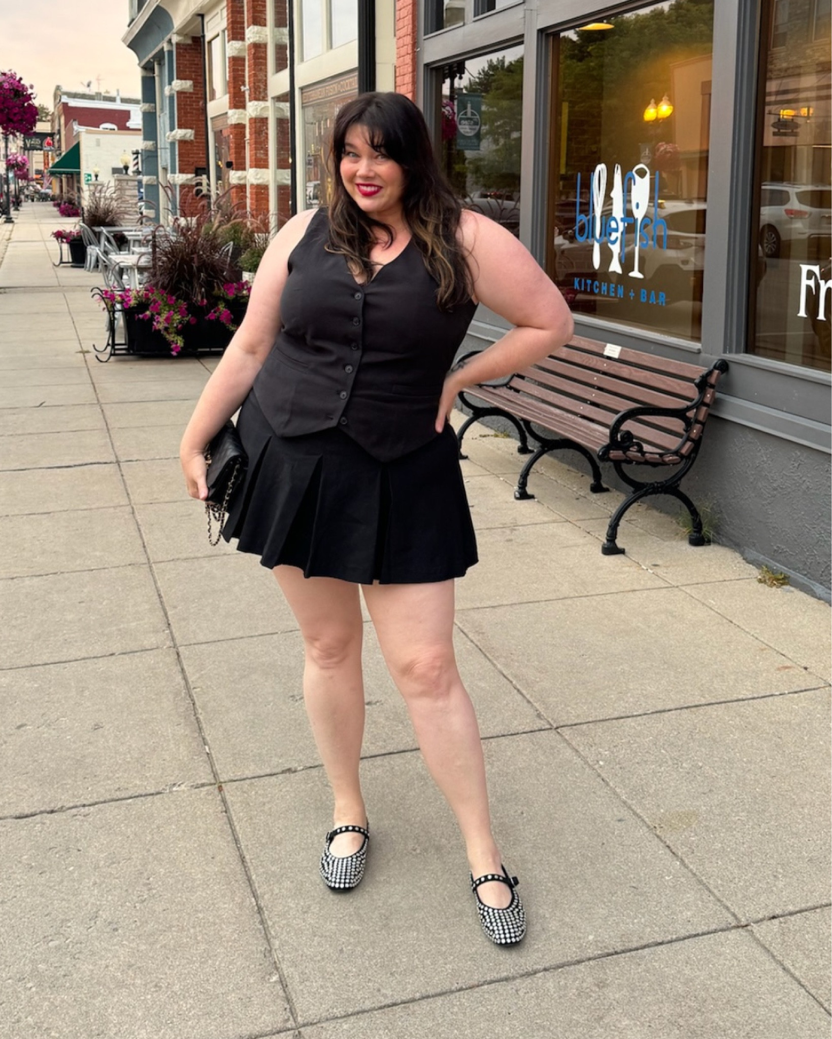 Plus size black vest with a black mini skirt. I don’t usually do all black but I love this look - especially with the RHINESTONE flats! Had so much fun styling this vest!

#LTKPlusSize