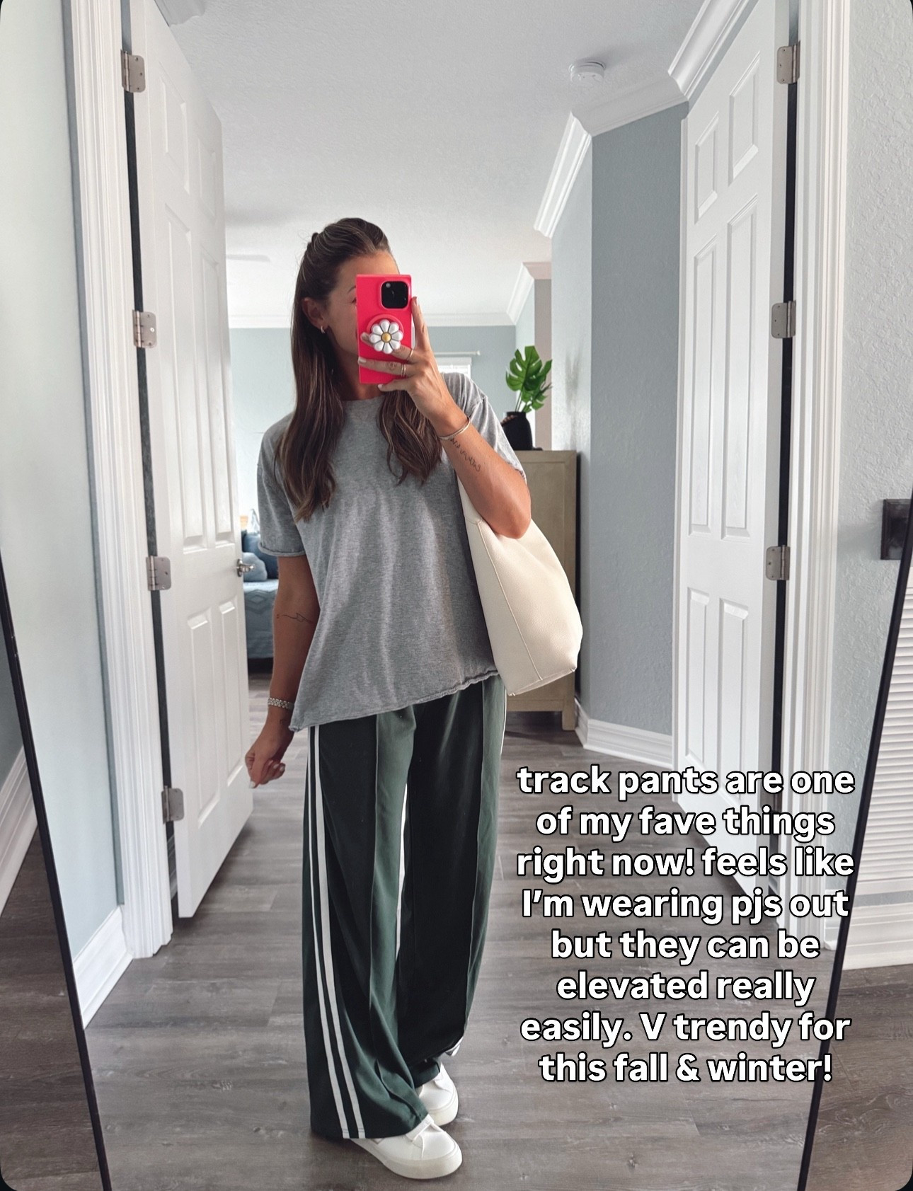 My exact pair is sold out but I linked similar!!! I have been living in track pants lately. LOVE. Size XS tee!! It’s the best  