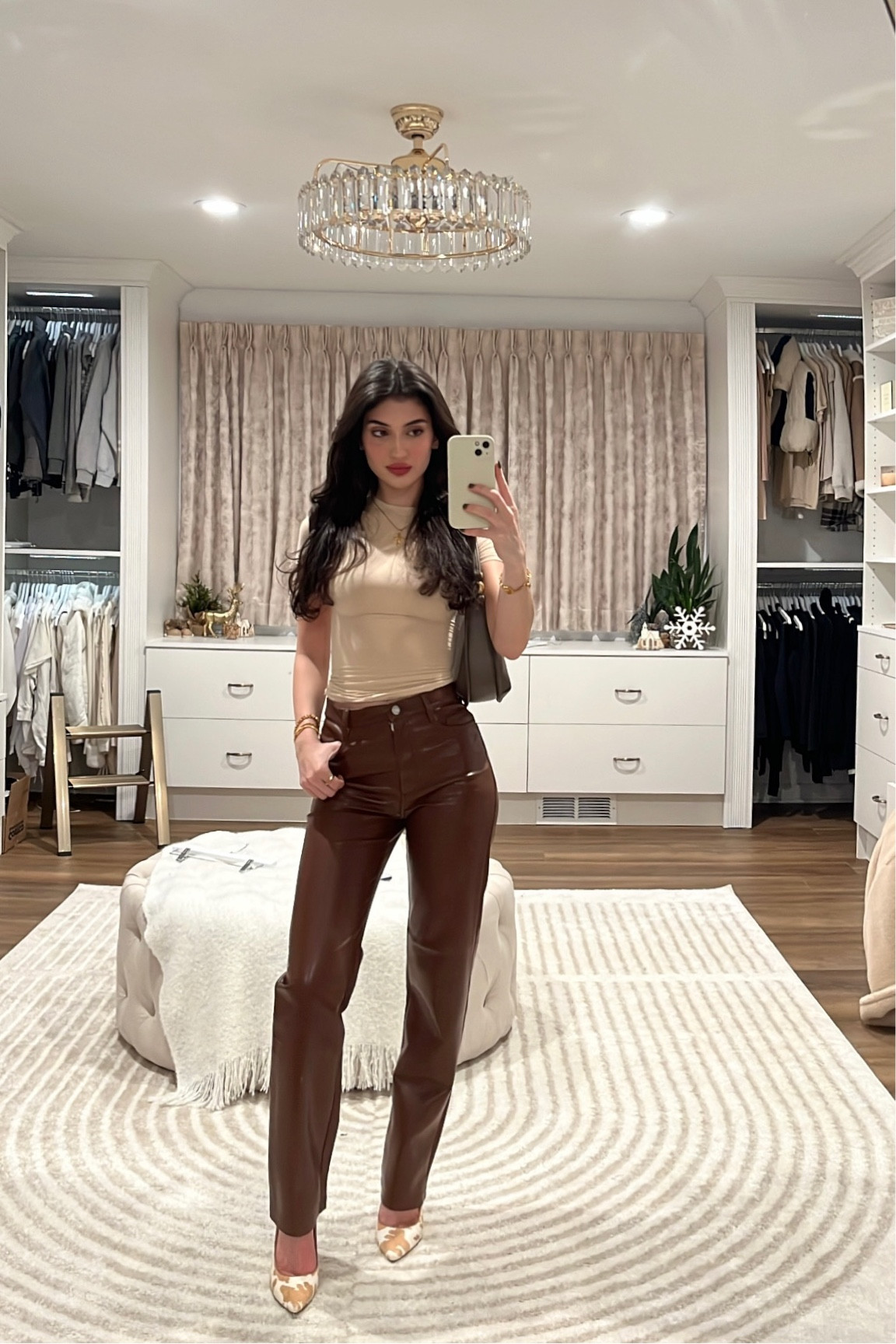 Wearing the coach eve bag in dark stone. Wearing a 00 in the Melina pants and xxs in the skims T shirt. Heels from Nine West but aren’t available anymore (linked another pair that goes perfectly with the outfit). #LTKHoliday #LTKbeauty

#LTKSeasonal