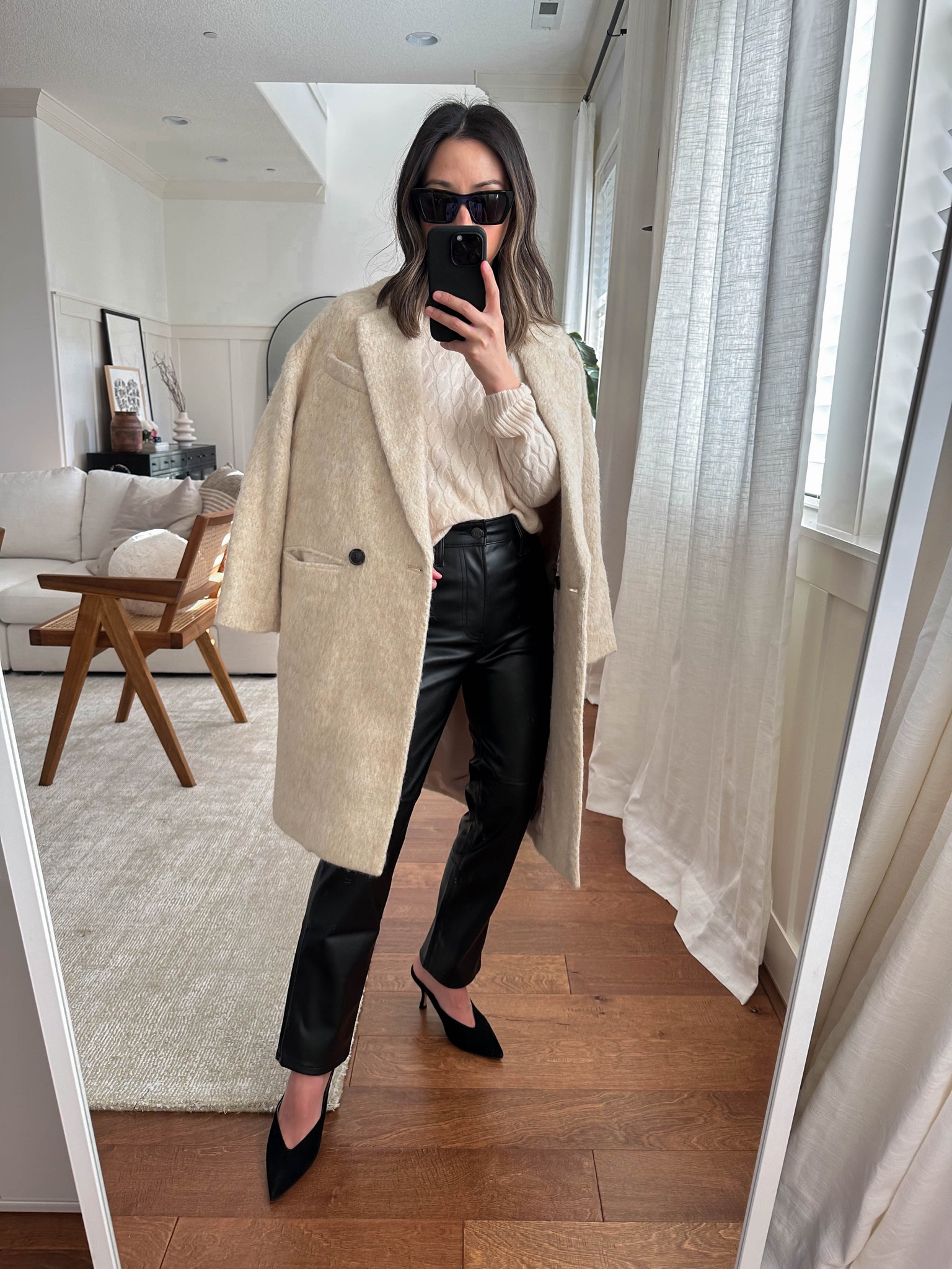 J.crew cashmere cableknit. Love this sweater. So soft a s beautiful. Sized  up to a small. Runs snug. 

Coat - j.crew petite 0
Sweater - j.crew small
Pants - Gap petite 25
Mule - Stuart Weitzman 35
Sunglasses - YSL