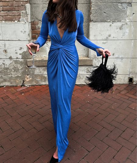 Blue wedding guest dress. Also comes in black. Feather purse  
