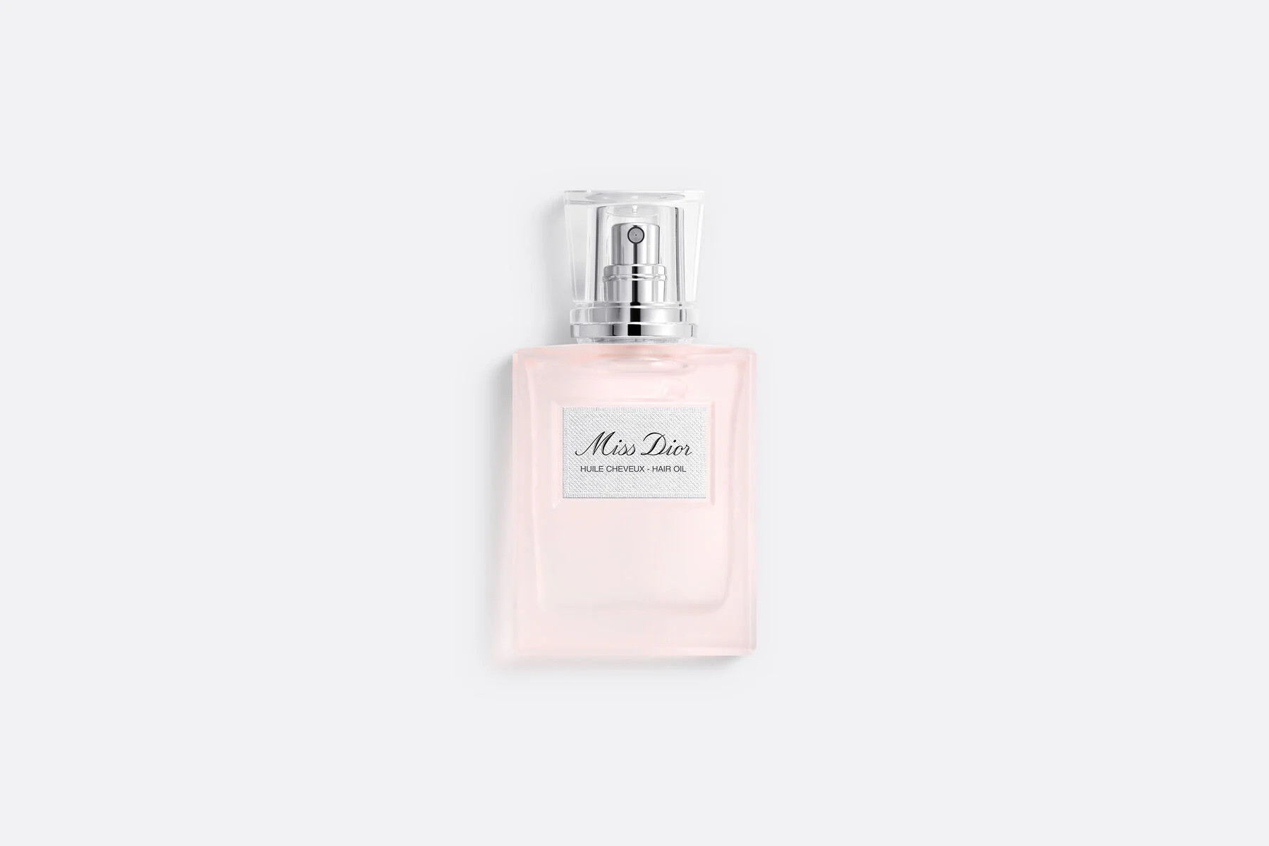 Miss Dior Hair Oil features a lightweight texture that nourishes and subtly perfumes the hair upo... | Dior Beauty (US)