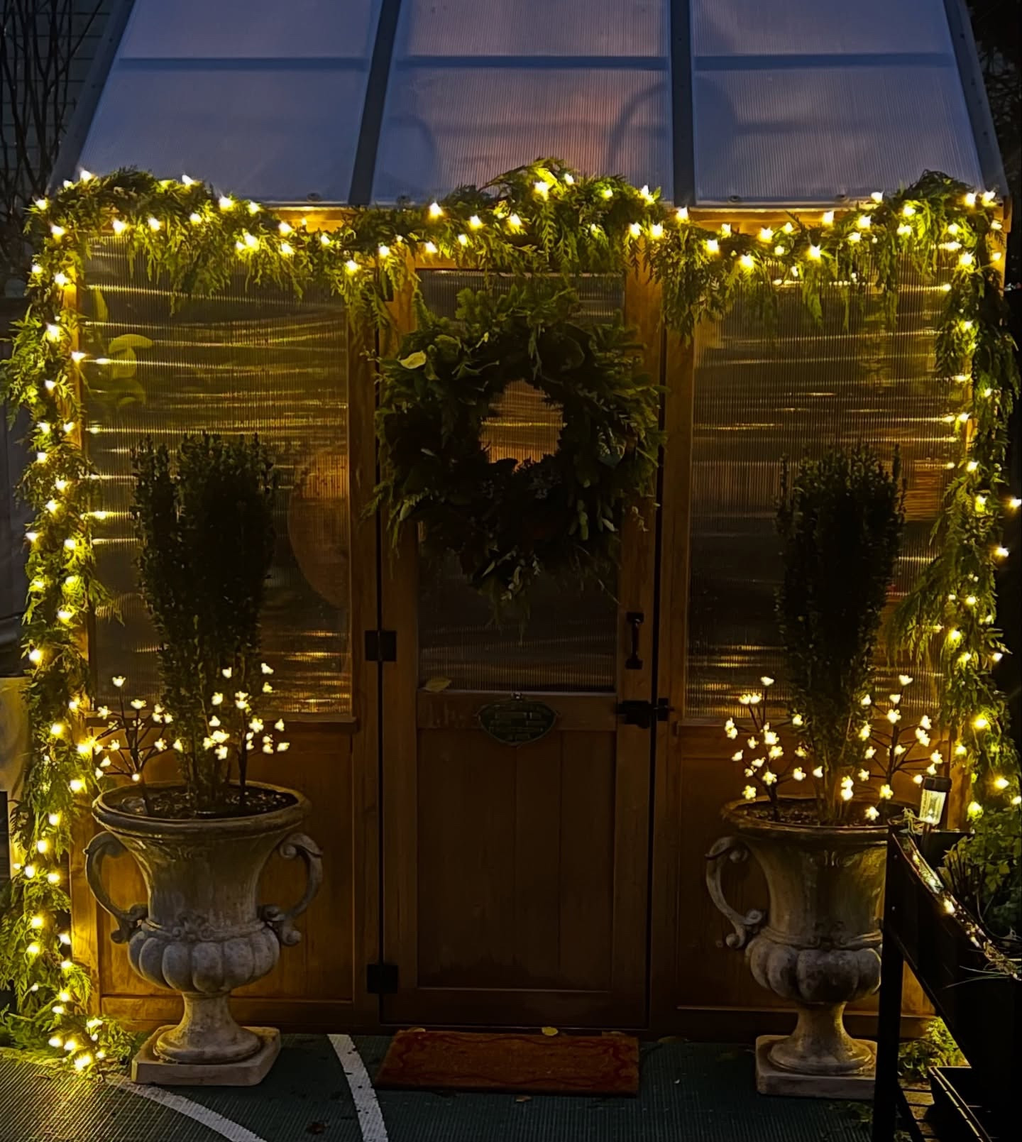The Greenhouse Day and Night🌙  Just when I think she couldn’t get any cuter🥰 

Comment SHOP for links to the PRETTIEST paper snowflakes that will make your space feel so magical inside or out! 

#greenhouse #christmasgreenhouse #christmasgreenery #christmaslights #holiday #gardening #garden