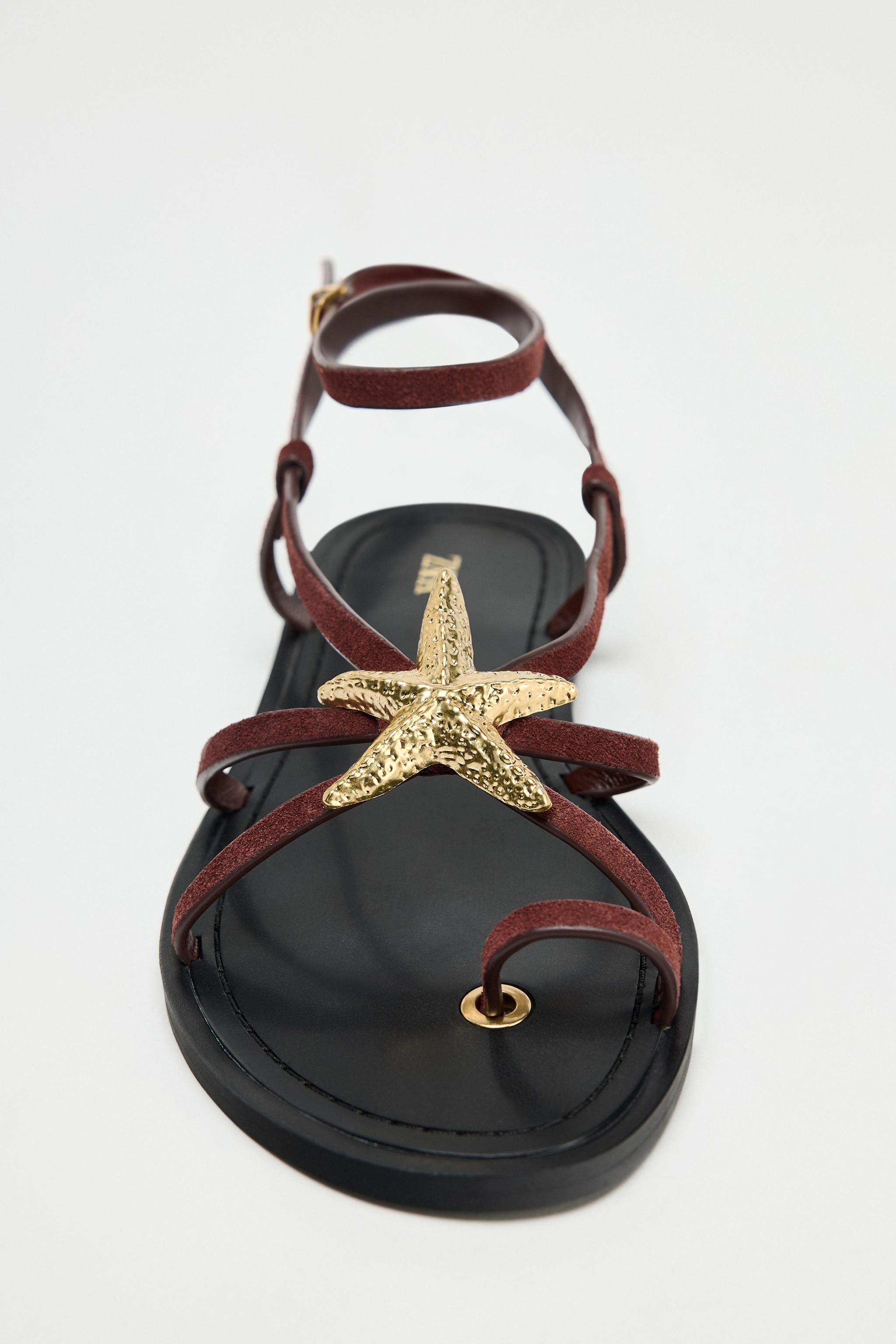 Flat suede sandals. Straps at the front with toe post. Star-shaped metallic detail on the instep.... | Zara US