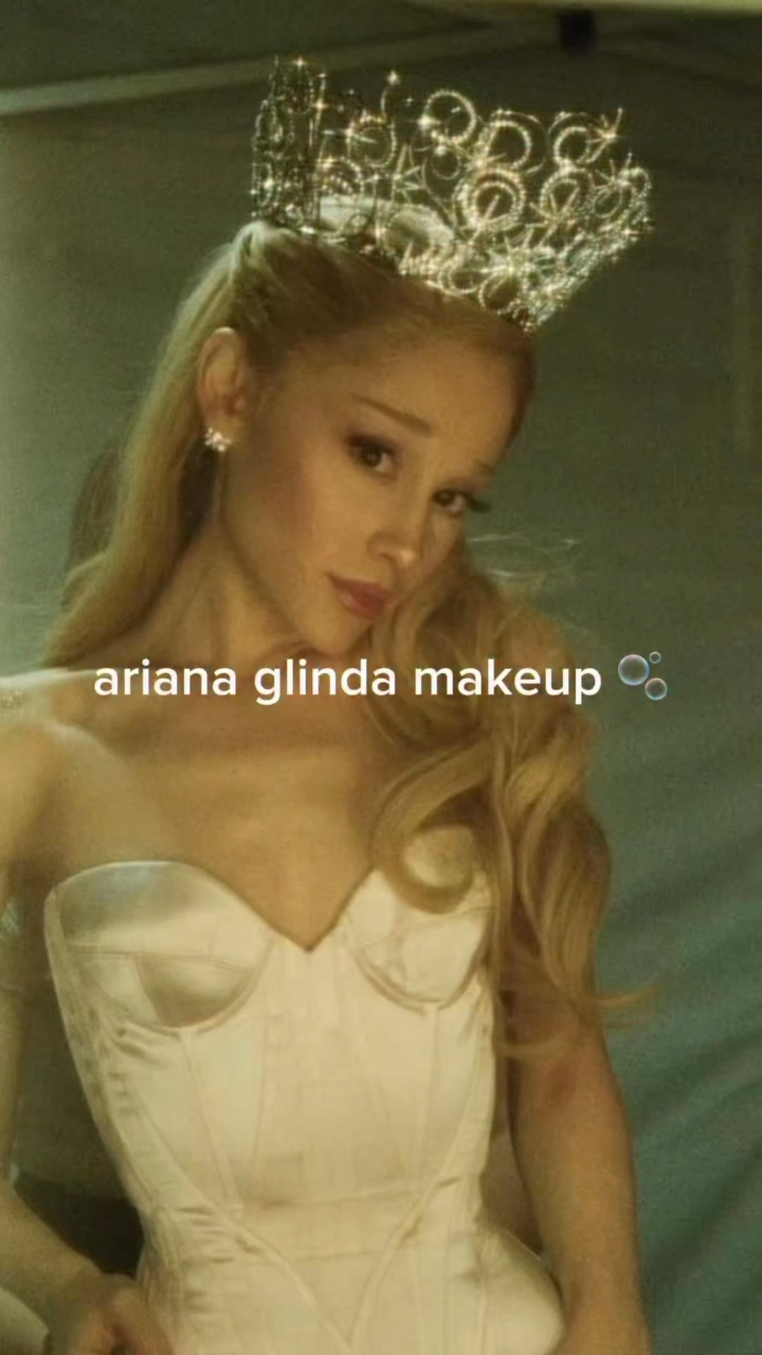 @arianagrande glindafied makeup 🫧 makeup artist: @manthony783 products use: @saiebeauty rose glow gel, @r.e.m.beauty foundation, @tower28beauty concealer, rem beauty cherry blossom blush, @onesize translucent setting powder, @milanicosmetics cheek kiss rose romance, @nyxcosmetics butter melt bronzer, @diorbeauty face palette, rem beauty glow stick in I come and go in a bubble, @morphebrushes rose frequency palette, @dollybeauty eyeliner, @revlon serum liquid liner, Morphe Nano Brow Pencil, @maybelline age rewind concealer, rem beauty mascara, @lillylashes self adhesive lash, rem lip liner in toss toss, rem beauty so popular lip oil @wickedmovie @wicked_musical @universalpictures @peacock #wicked #wickedforgood #arianagrande #glindamakeup #rembeauty