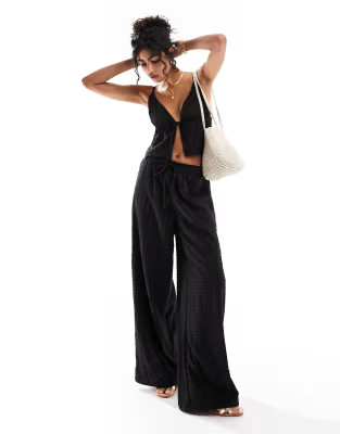 Esmee Exclusive beach textured wide leg trouser co-ord in black | ASOS (Global)