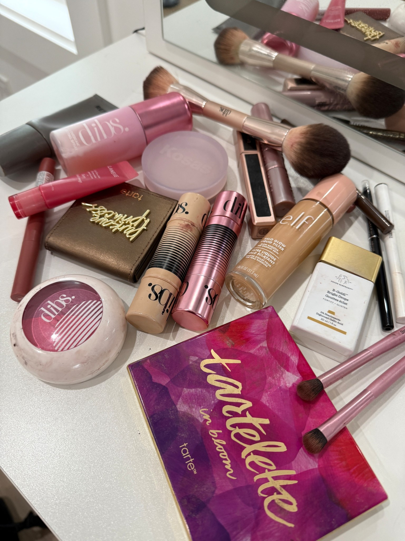 Current makeup faves living rent free on my vanity! From my go-to DIBS jam sesh lip in Jam Jam to the buttery soft GlowTour Duo in Starlit, this lineup is full of ride-or-dies.
Shoutout to the DIBS “On The Rose” lip liner, VIP Pink Duet Blush, and You’re Set In Setting Spray—because glowy skin and long wear is the vibe. Also living for Laneige lip, Maline NY, ELF Halo Glow, and the iconic Tartelette in Bloom palette for soft glam magic.

Keywords:
makeup flatlay, DIBS beauty, daily makeup routine, soft glam essentials, glowy makeup, spring beauty, clean girl aesthetic, blush goals, Tartelette in Bloom, ELF Halo Glow, Kosas, Laneige lip balm, makeup must-haves, everyday glam, vanity goals 

#LTKStyleTip #LTKBeauty #LTKFindsUnder50