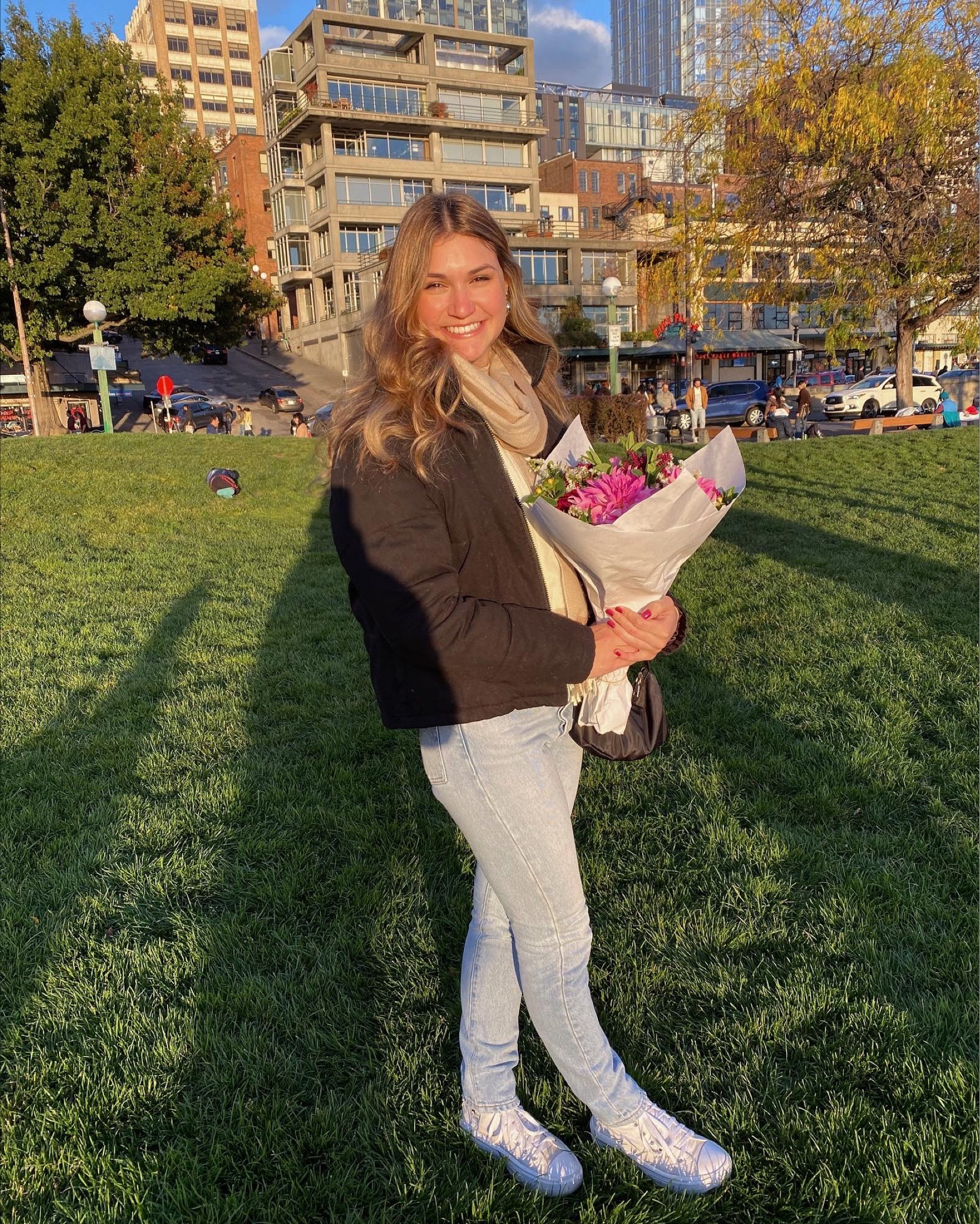 An outfit for a walk around Pike Place Market in Seattle! This was super comfortable and warm for the winter. I wore a tan turtle neck, white sweater vest, matching scarf, light wash Levi’s, white converse, and layered with a black puffer jacket! 

#LTKCyberweek #LTKunder100 #LTKSeasonal