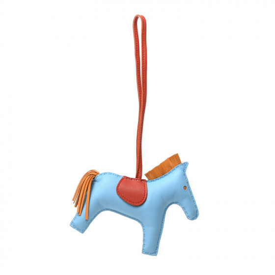 HERMES

Milo Lambskin Grigri Rodeo Horse Bag Charm MM Celeste Naturel Bouton D'Or Cornaline | Fashionphile