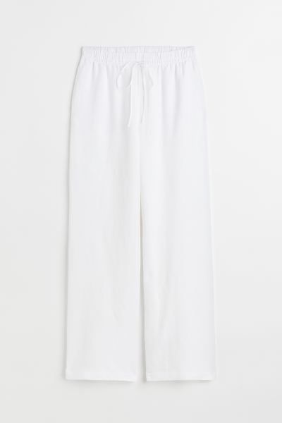 Pants in a woven linen and viscose blend. High waist, drawstring waistband with covered elastic, ... | H&M (US)