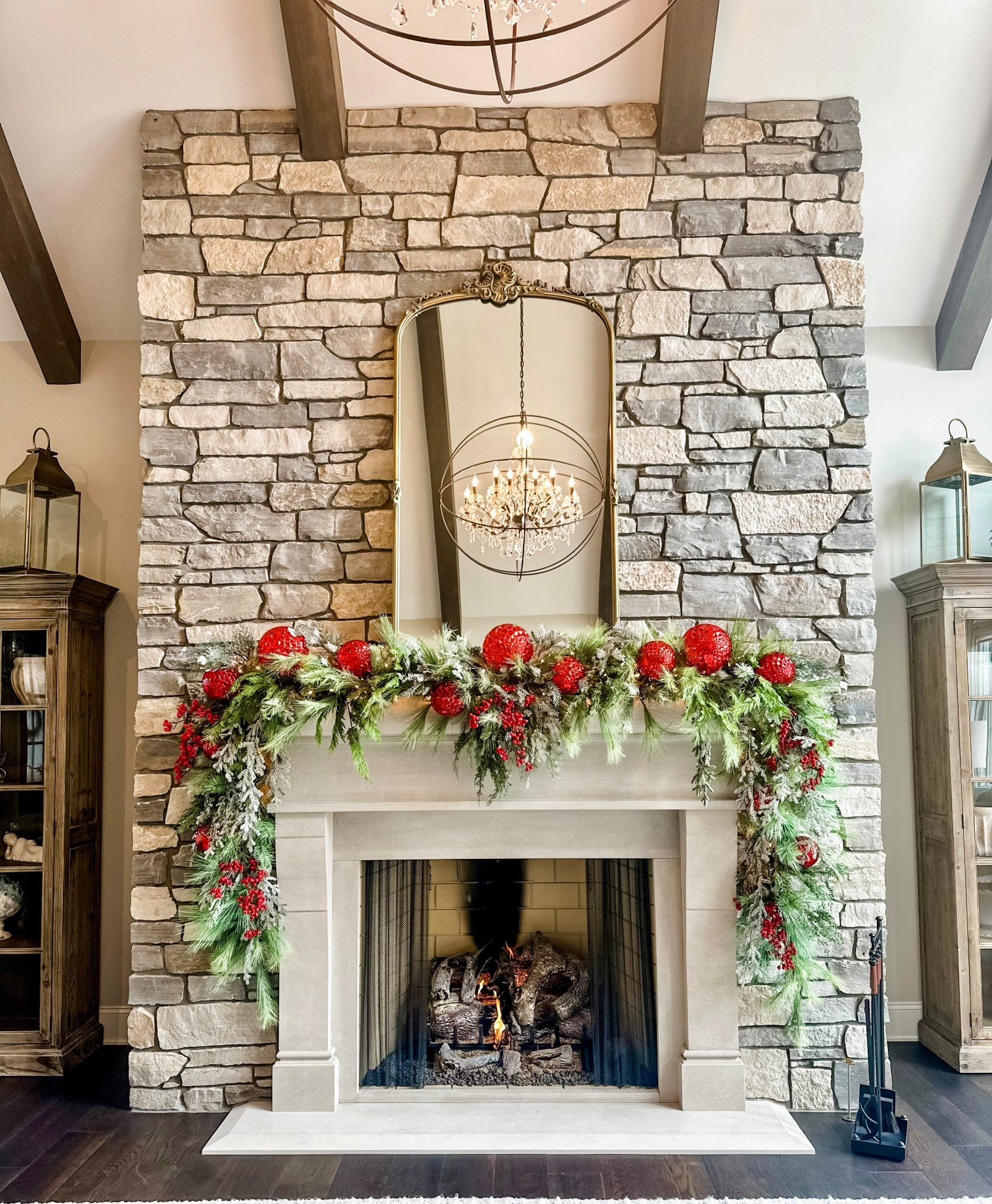 Classic Christmas red meets timeless stone + greenery 🤍🎄
Cozy, elegant, and just a little bit Ralph Lauren holiday magic.

Inspired by the iconic styling of Ralph Lauren holiday interiors, this mantel features a grand, sweeping evergreen garland accented with deep crimson tones and refined winter textures. Rich, warm, and effortlessly elegant.

#HolidayMantel #ChristmasDecor #ElegantChristmas #RalphLaurenHome #TimelessDesign #HolidayStyling #ChristmasInspiration #InteriorDesign #ClassicChristmas #LuxuryInteriors #DesignerHome #StylingDetails #DecorInspo #StyledSpaces
