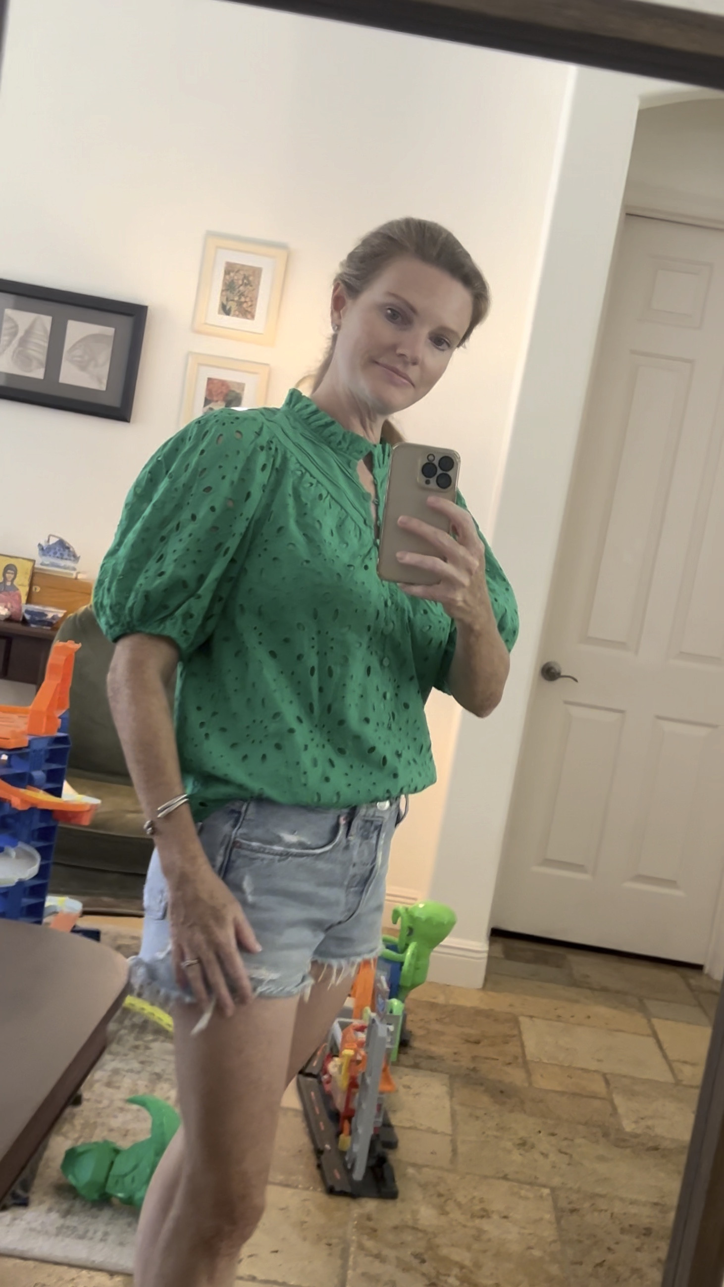 Love this Anthropologie inspired top from Amazon. The eyelet fabric, covered buttons, and ruffle collar make it so pretty! Looks great with jeans or jean shorts. Comes in over 10 colors! I have the green in a size small. 

#LTKFindsUnder50 #LTKStyleTip #LTKOver40