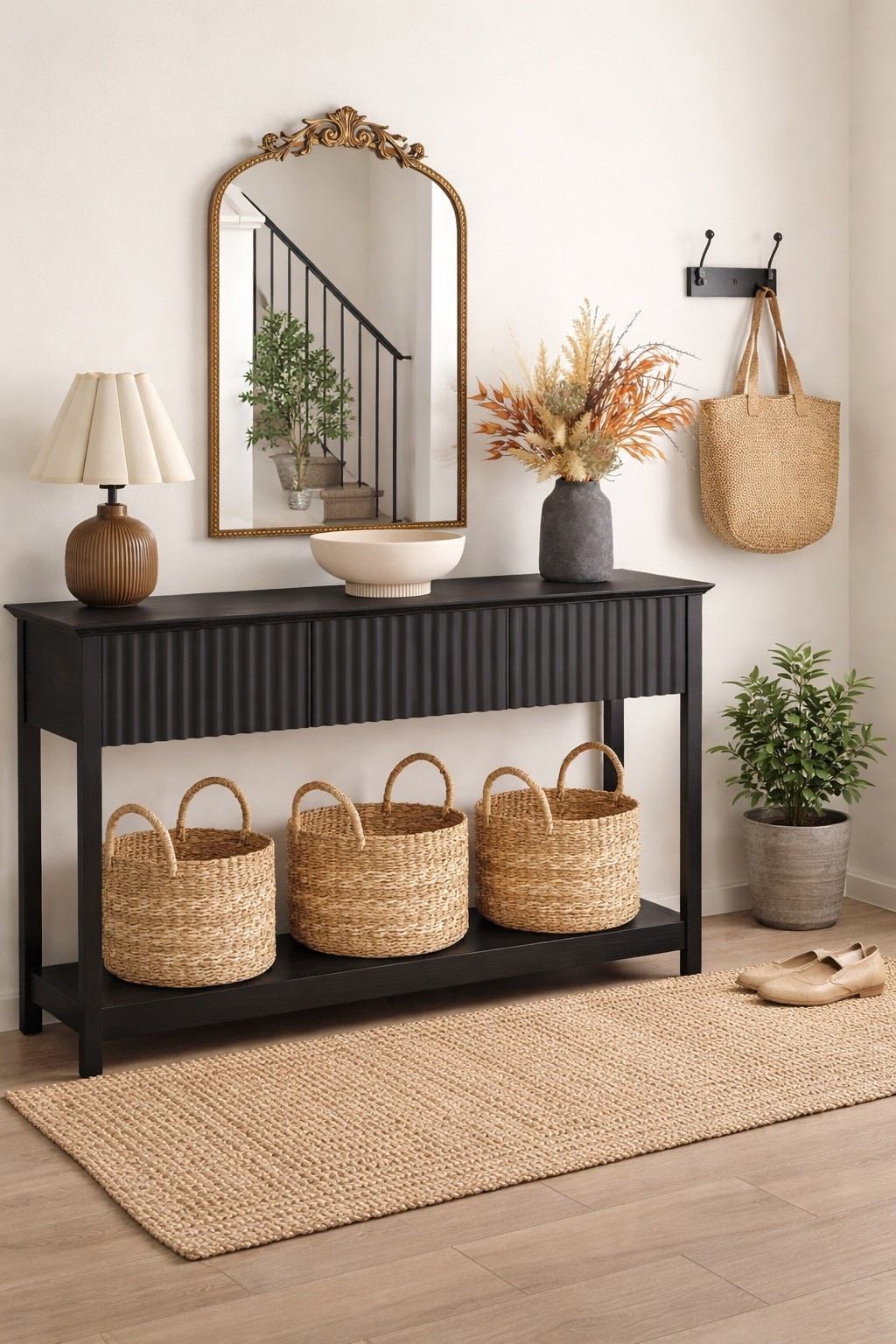 Entryway decor, neutral home decor, modern farmhouse style, black console table, entryway table styling, gold mirror, woven baskets, entryway storage, hallway decor, neutral rug, cozy home, minimalist decor

#LTKHome