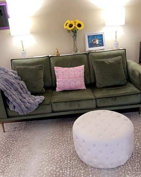 Home decor green velvet couch animal print rug velvet ottoman fur blanket #stylebysarahelizabeth

#LTKhome #LTKSeasonal #LTKstyletip