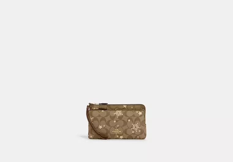 Double Zip Wallet In Signature Canvas With Star And Snowflake Print | Coach Outlet US
