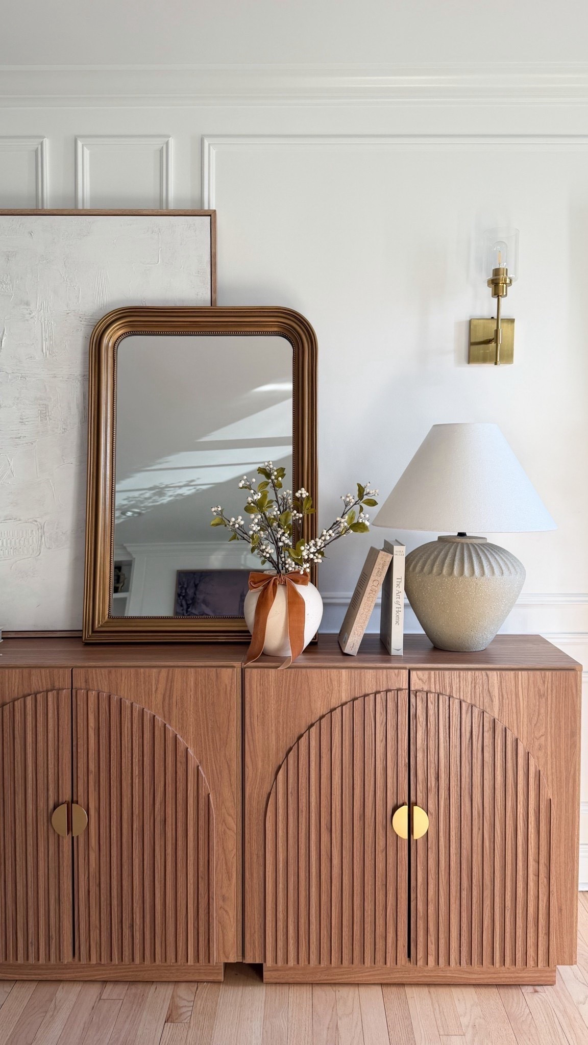 I still can’t believe this mirror is under $200 🤍
It looks so high-end in person — the gold tone, the shape, the little beaded detail… obsessed. Paired it with my favorite lamp, a couple of coffee table books, and a simple vase with a ribbon and it instantly elevated this whole console ✨


#ltkhome #entrywaydecor #neutralhome #modernorganic #designerlookforless

Follow my LTK @meggieferrerhome on the @shop.LTK app to view this post and get my exclusive app-only content!

