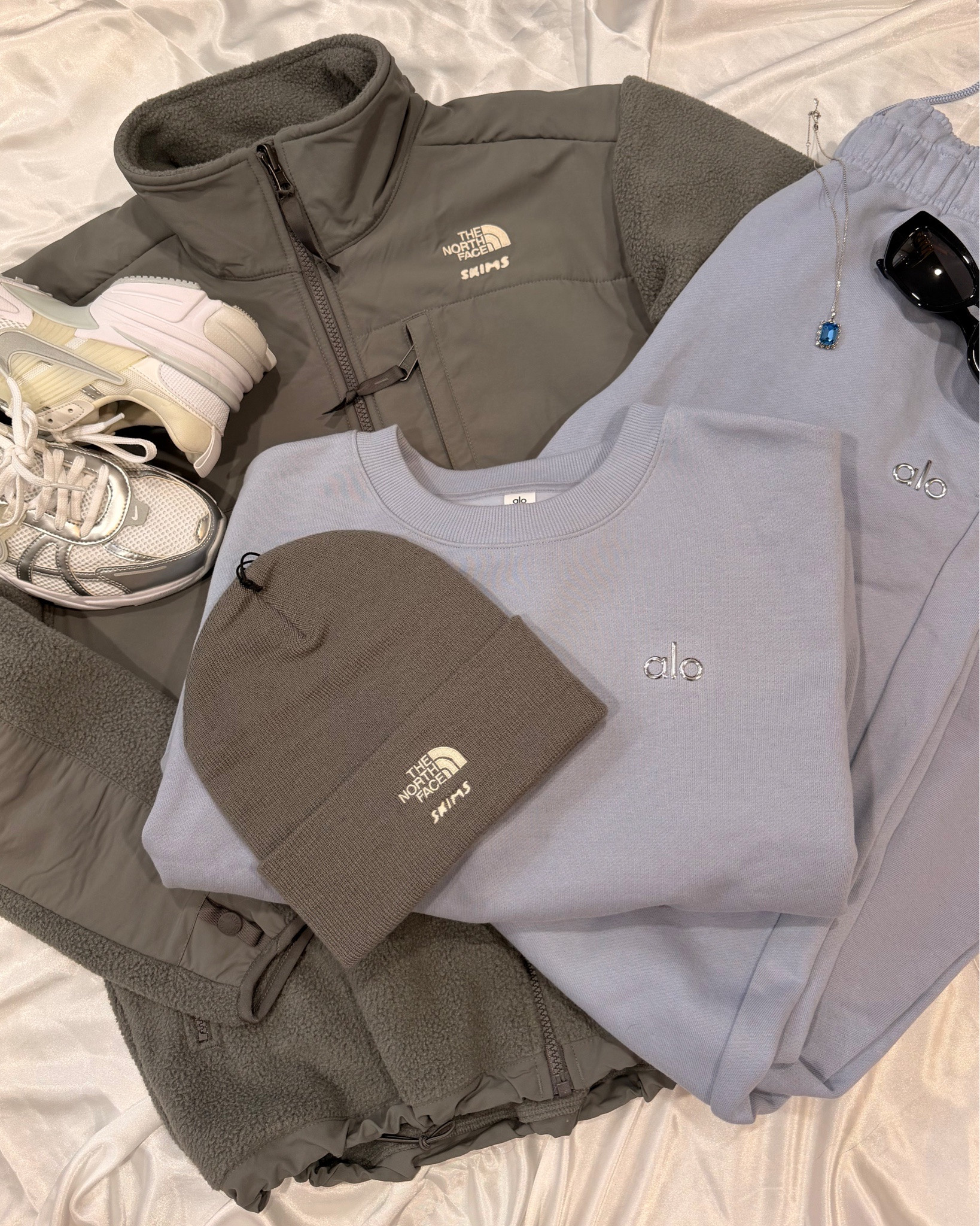 I absolutely love the color of icy, blue and light gray together in the winter!❄️

The lighting is not doing this beautiful alo set justice, but it’s the perfect icy baby blue. I always wear a small in their accolade collection! 

The North Face X SKIMS fleece is still  the original style from the 90s with a twist! So warm like a winter coat and so many pockets! Adjustable all over and runs oversized! I’m got a small and there’s a lot of room

The Nikes are trending with the silver tones. Perfect “dad shoe” and so comfortable! 

Everything is linked below, including the sunglasses that are for sale on my Poshmark! 



#LTKActive #LTKfitnessgoals #LTKootd