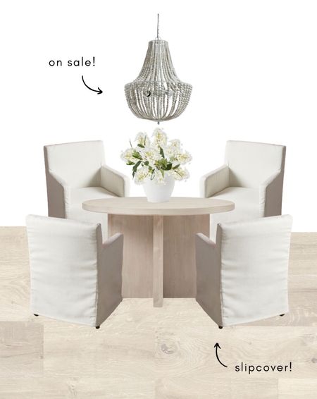 Cute little dining nook design! These chairs are new and slipcover! Chandelier is on sale and this round table is gorgeous!

Dining room furniture, round table, round dining table, dining room chairs, captain chairs, slipcover chairs, beaded chandeliers, chandeliers, light oak floors, wood floors, laminate flooring, vase and stems, faux flowers

#LTKsalealert #LTKhome #LTKSale