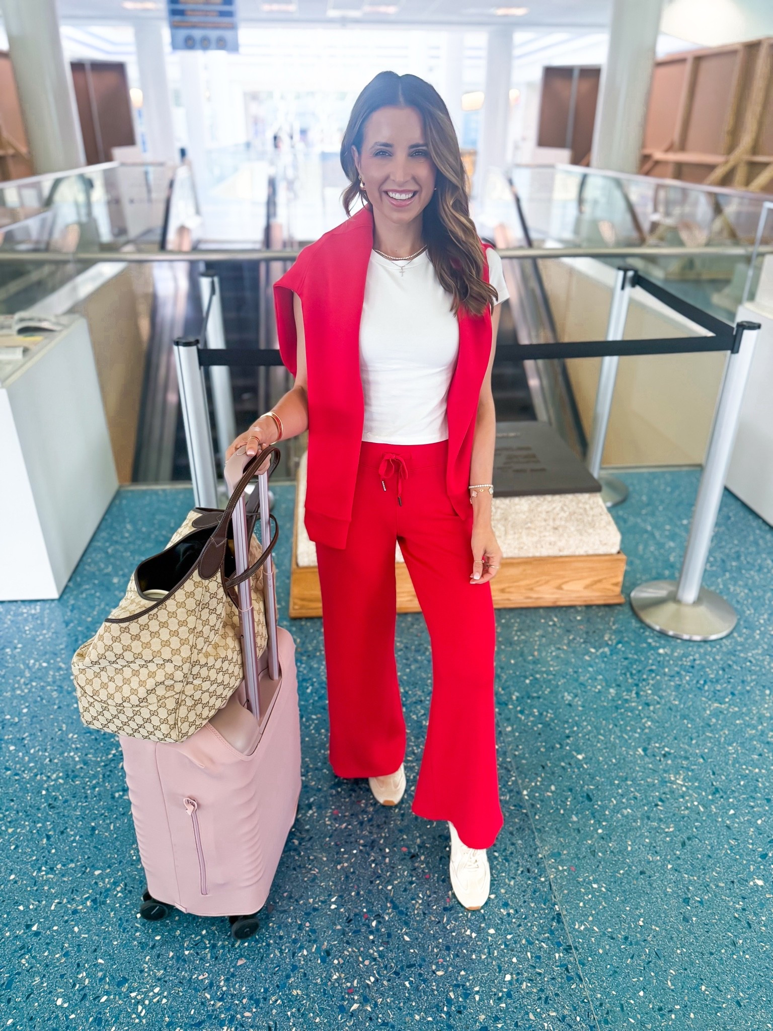 My airport travel outfit of the day! Airport outfit. Spanx matching set in XS petite (pants) and XS in top. Code LISAMARIEXSPANX on first time purchases. Abercrombie baby tee in XS. Tory Burch Field Sneakers feel like walking on a cloud - I went up half a size. Gucci Mercato tote in large.

#LTKootd #LTKdayinmylife #LTKTravel